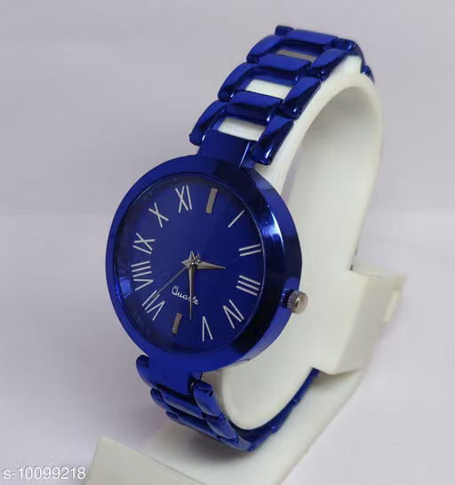 A blue analog watch with a matching blue link bracelet and a blue dial, displayed on a white stand against a light gray background.